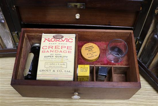 A 19th century mahogany apothecary cabinet